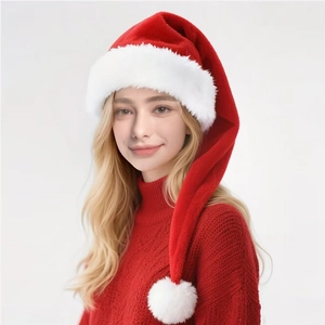 Detail of red plush Christmas hat with thick white faux fur trim worn by a model