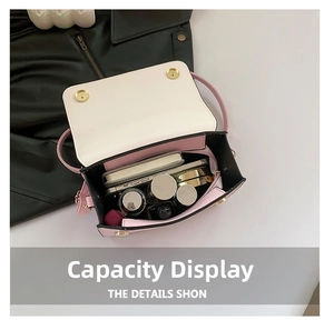 Top view of the pink and beige crossbody bag interior showing daily essentials capacity
