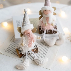 Christmas plush angel girl ornaments with warm string lights for festive table decoration