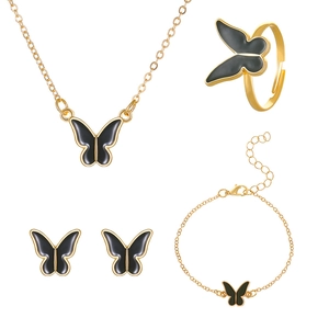 Conjunto de joyas de mariposa dorada con collar, pulsera y pendientes de esmalte negro