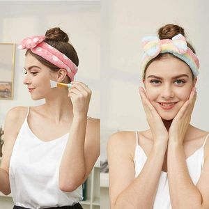 Plush coral fleece bow headbands in pink polka dot and rainbow styles for face washing