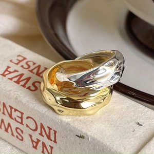 Set of two S925 sterling silver rings with irregular tin foil texture in gold and silver