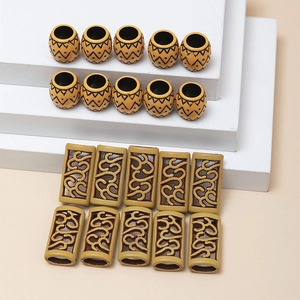 Ethnic style dreadlock beads with vintage pattern and hollow filigree design on stand