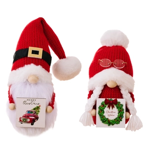 Knitted Christmas gnome dolls with Merry Christmas wooden signs and red hats
