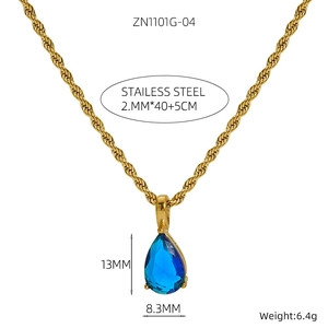 Detail of twisted chain necklace with a blue teardrop pendant in 18K gold plated steel