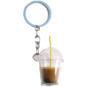Creative bubble tea keychain with brown liquid and black pearls on a silver metal chain