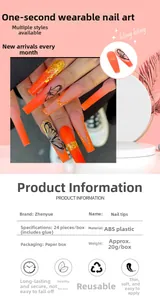 Detailed view of orange butterfly press-on nails with gold foil accents and 24 pieces set