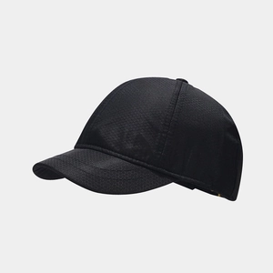 Macro detail of breathable black quick-dry fabric with hexagonal honeycomb texture on cap