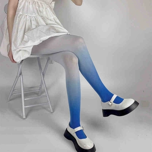 Blue and white gradient velvet tights shown with Mary Jane shoes and white skirt