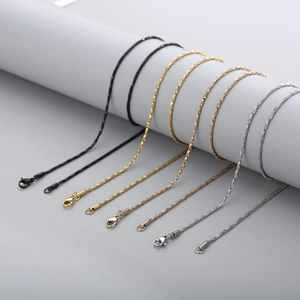 Sleek stainless steel snake chains in black, gold, rose gold, and silver finishes