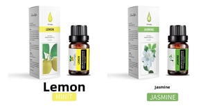 Detail view of 10ml lemon and jasmine essential oil bottles with matching packaging