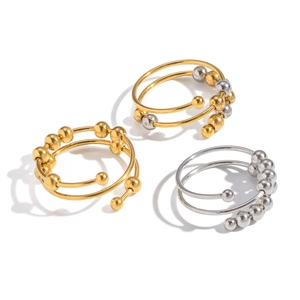 Anello antistress con sfere mobili in acciaio inossidabile oro e argento design aperto