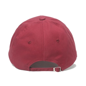 Detail view of burgundy cotton baseball cap featuring an adjustable strap and metal buckle