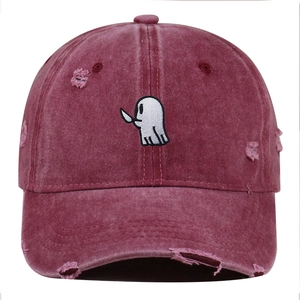 Detailed embroidery of a ghost with a knife on a distressed burgundy washed cotton cap