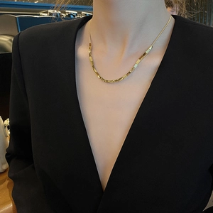 Chic gold titanium steel square link snake chain necklace worn by a female model