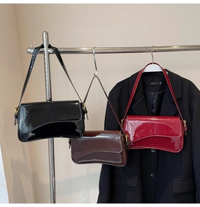 Three colors of patent leather shoulder bags with asymmetric wave flap and gold hardware
