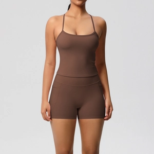 Detail of coffee brown yoga set featuring camisole top and high-waist side pocket shorts