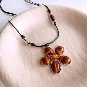 Vintage resin flower necklace with tiger eye stone pendant on adjustable cord