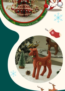 Detail of Christmas reindeer plush with red green striped ribbon and gold bell accent