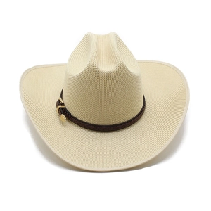 Detail of cream woven cowboy straw hat featuring a brown leather band and metal buckle