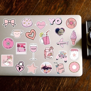 50 pieces of cute pink girlhood doodle stickers on a silver laptop with a matte finish