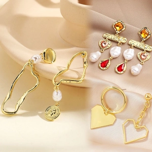 Baroque pearl and gemstone gold earrings set with heart charms and coin reliefs