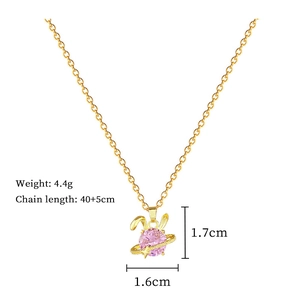 Detailed view of pink rabbit planet pendant with gold chain dimensions and weight info