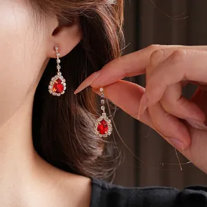 Elegant waterdrop red zircon tassel earrings set for women featuring luxury crystal accents