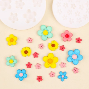 Daisy and cherry blossom silicone molds with colorful resin flower crafts display