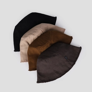 Corduroy bucket hats with frayed edges in black, beige, brown, and dark gray colors