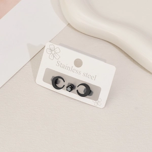3-piece black stainless steel earring set featuring crescent moons and a round zircon stud