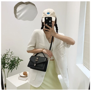 Fashionable black PU leather crossbody bag with metal buckle and golden chain strap