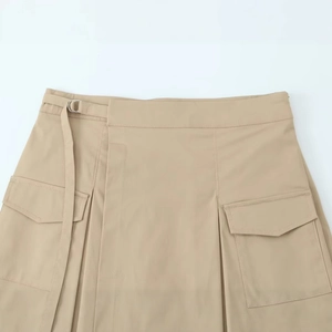 Khaki high-waist cargo skirt with functional flap pockets and matching belt detail
