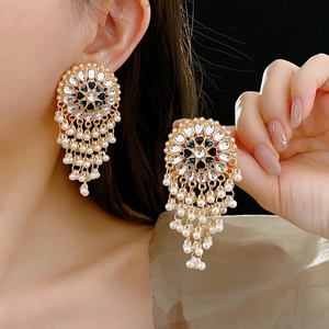 Vintage gold heart drop earrings with white pear-shaped rhinestones and pearl tassels