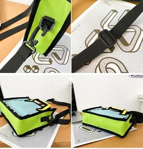Detail view of 2D cartoon style tote bag showing shoulder strap hooks and nylon texture