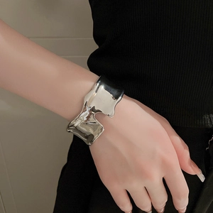 Silver minimalist irregular lava open cuff bracelet with polished metallic finish