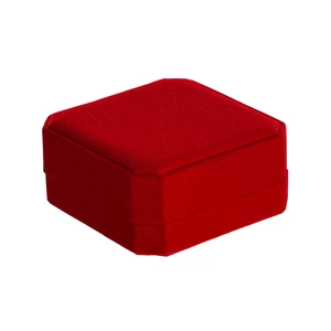 Macro shot of an octagonal red velvet jewelry box for rings or stud earrings
