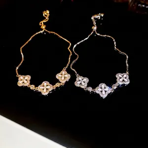Verstellbare Kleeblatt-Armbänder in Gold und Silber mit Zirkonia und Perlmutt-Effekt