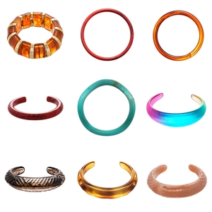 Collection of vintage acrylic bangles in assorted colors and marbled resin textures