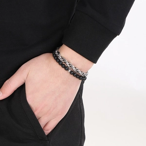Men's double-layer bracelet set with silver chain and black matte onyx beads on wrist