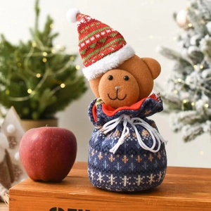 Knitted Christmas bear drawstring gift bag with Nordic snowflake patterns and red hat