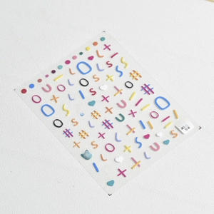 Detail of 5D embossed nail art stickers with 3D macaron geometric lines and heart shapes