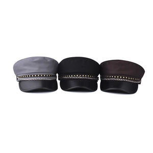 Fashionable military caps featuring star studs and chain detail available in three colors