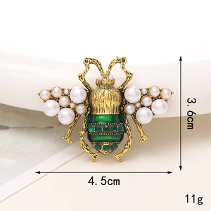 Spilla a forma di ape vintage con perle bianche e cristalli verdi, 4,5cm x 3,6cm