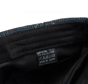 Detailed view of care label showing 30% wool blend and 70% polyester material composition