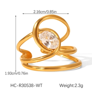 Macro view of gold spiral zircon ring with size and weight measurement details