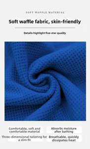 Close-up of dark blue waffle fabric texture with high water absorption and soft feel