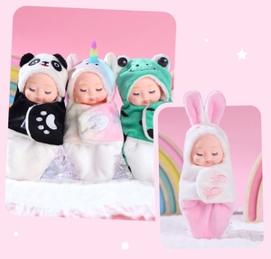 Detailed view of mini sleeping baby dolls wrapped in soft panda and rabbit plush swaddles