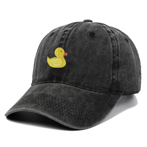 Washed black denim baseball cap featuring a yellow duck embroidery on a white background