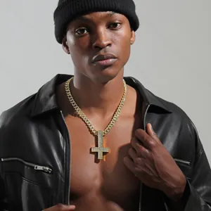 Hip hop gold Cuban chain with luxury iced out inverted cross pendant worn by model